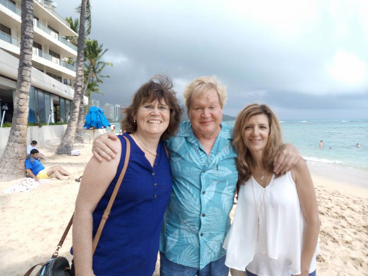 Gary with his former wife, Karen, and his wife Cindy on Waikiki Beach, July, 2016